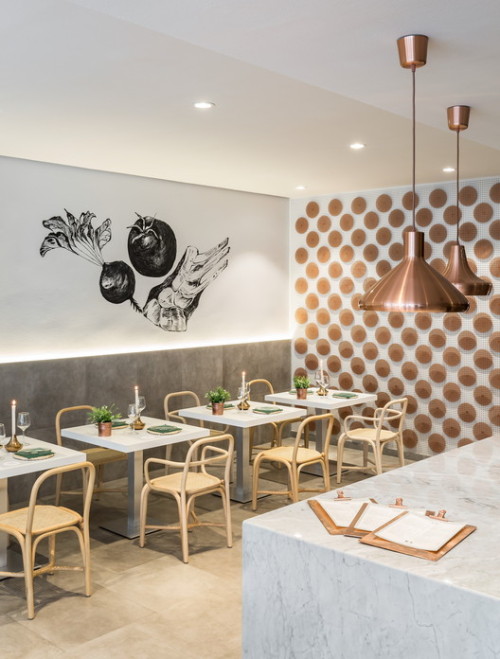 {Spanish firm estudiHac designed this restaurant in Valencia, using traditional materials such as ma
