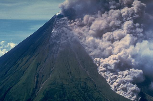 &ldquo;Ash clouds rise above a pyroclastic flow traveling down the Buang valley on the upper NW 