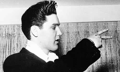 vinceveretts:  Elvis in his hotelroom in Miami, March 22, 1960. 
