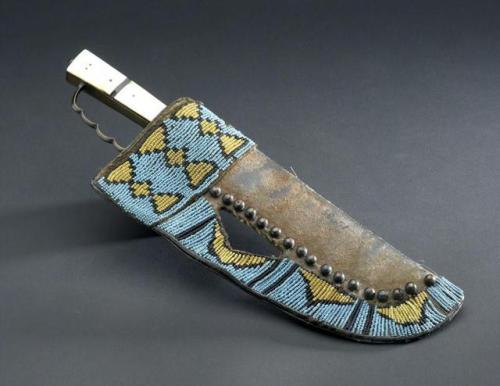Blackfoot knife with mother of pearl handle and beaded sheath, Alberta Canada, circa 1875.from The R