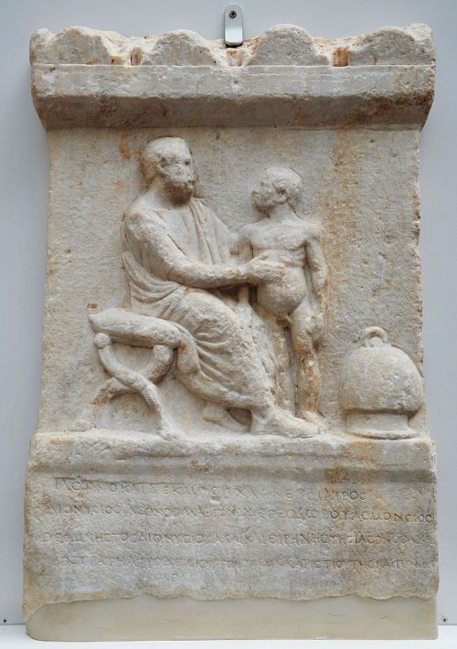 Marble relief of a physician named Jason, also known as Decimus, treating a patient.  Artist unknown
