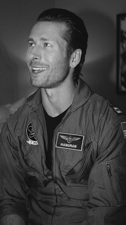 Glen Powell flight suit party