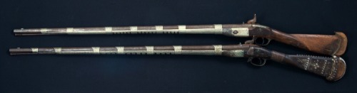 A pair of Arab decorated Enfield M1853 percussion muskets, mid 19th century.