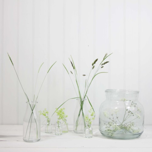 looptheloopuk: We love these glass vases decorated with lush, green cow parsley and stems of a varie