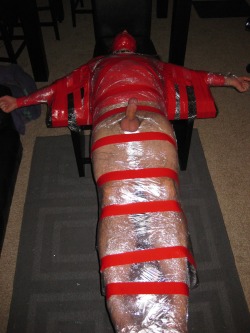 bondagejock:  Taped to a bench. Forced cup
