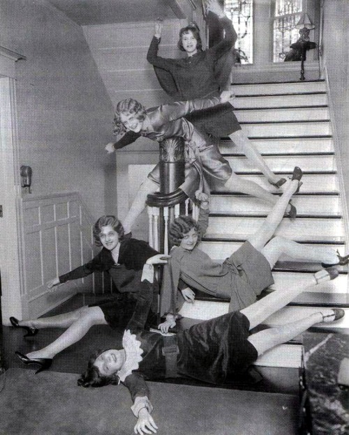 Porn Girls goofing off on stairs, location unknown, photos