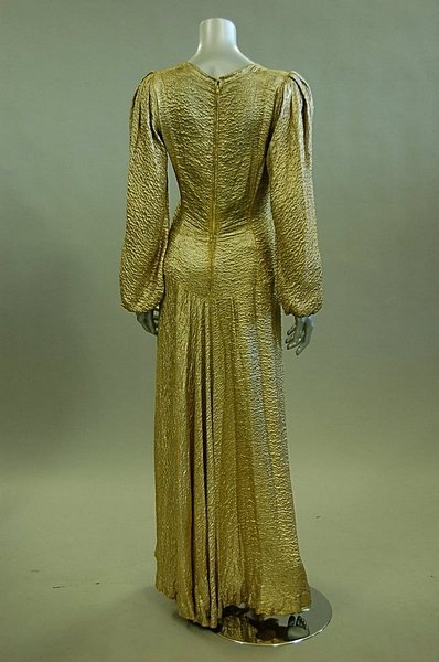 talkingpiffle:Fierce bustle about wedding-dress—Worth's—period gown in stiff gold brocade, long slee