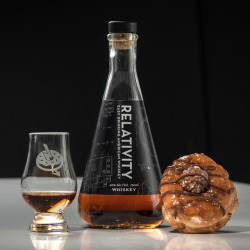 whiskyanddonuts:Relativity Whiskey &amp; Ferrero Roche Hazelnut Crunch - This pairing could potentially ruin us permanently as almost everything about the whiskey featured here opposes the traditional methods we have all come to love in whiskey culture…