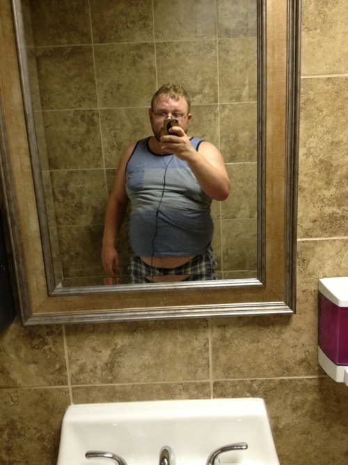 shades07:  I think this tank might be a smidge too small… Rocking some belly at the laundromat.