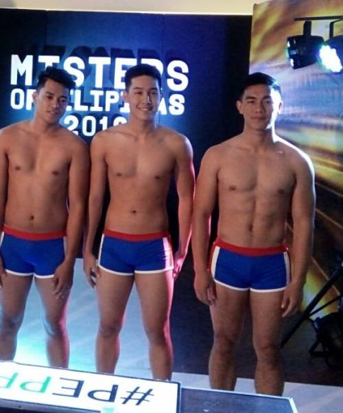 mashitayeah:  Police Officer Chris Comicho Dulagan  Hope he wins Mister Philippines. Igorot with meaty buns. Hihihi. I saw him on duty patrol once in Quiapo, Manila near Plaza Miranda. The first photo i think is taken near the SM outlet store in same