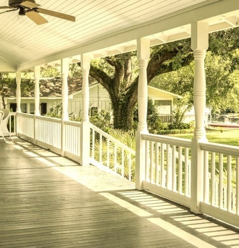 Miami PorchThis Is An Illustration Of A Sizable Farmhouse Porch With Decking And An Added Roof.