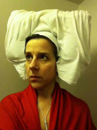 anticonfluentialist-deactivated:  While in the lavatory on a domestic flight in March 2010, I spontaneously put a tissue paper toilet cover seat cover over my head and took a picture in the mirror using my cellphone. The image evoked 15th-century Flemish