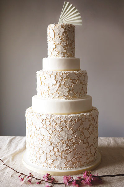 Who says an all-white wedding cake is boring? Layering a white texture (like these amazing floral de