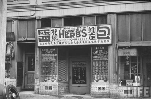 A view showing the exterior of a Chinese herb store in a Californian Chinatown. Taken by Peter Stack