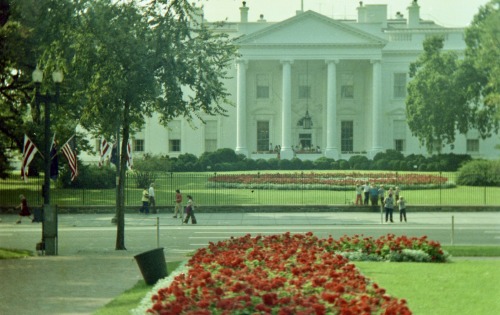 The White House From Lafayette Park, Washington, DC, Summer 1972.The crowd under the portico is wait