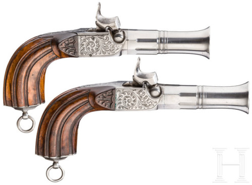 A pair of percussion pocket pistols crafted by Lebeda of Prague, mid 19th century.from Hermann Histo