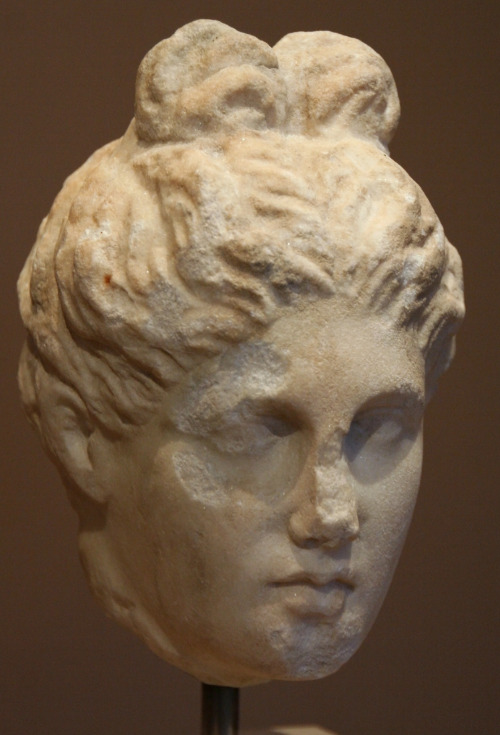 A head, thought to be from a marble statue of the goddess Artemis.  Unknown artist, ca. 350-300 BCE.