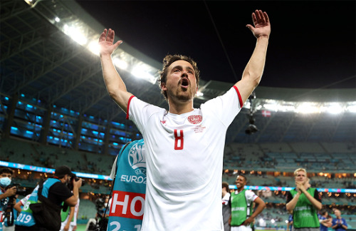 Players of Denmark celebrate their victory after the match vs. Czech Republic