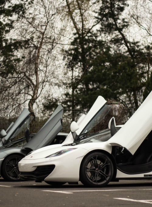 exclusive-pleasure:  d0minus:  carbonandfiber:  McLaren Doors Up - C&amp;F  Omg