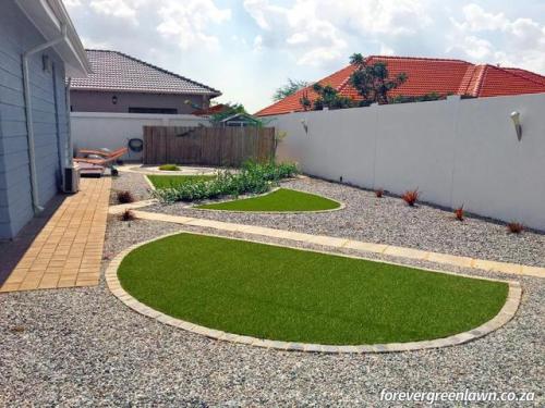 Client garden – minimalist and with artificial grass. No wasting of precious water during wate