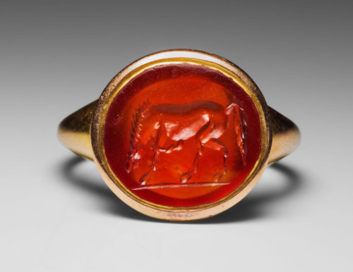 ancientjewels:1st century Roman engraved sardonyx gemstone. Gold ring is a modern setting. From the 