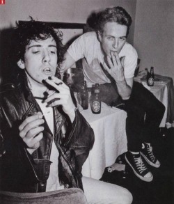 dougmenagh:Mick Jones and Joe Strummer smoking… something….