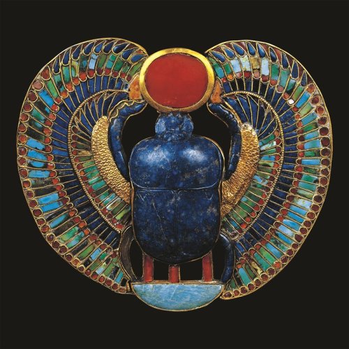 blondebrainpower:Pectoral of deity Khepri, a winged scarab beetle. Khepri, god of the rising of the sun. The scarab pushes the sun disc above the horizon and sits on a neb (i.e., basket) supported by three strokes of plural sign. Belonged to Tutankhamun