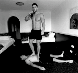piledriveu:  knocks him out in a hotel match……then pins him by standing on his beaten KO worthless bod…….and drinks a beer!!! fuckin hot!! 