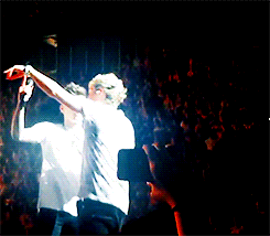 kryptoniall-deactivated20150613:  niall pointing to the person who sent the twitter question and zayn laughing because the person’s twitter name had “ziall" in it. (link) 