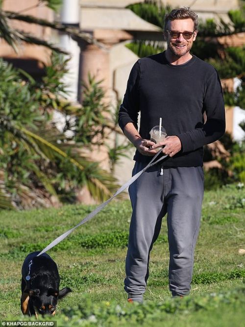 Simon with his daughter Stella walking his dog in Sydney, june 14 2020