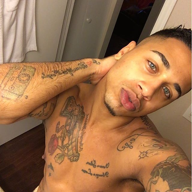 dominicanblackboy:  A cute moment wit Sexy tatted blue eyed rican Blu Rose and that