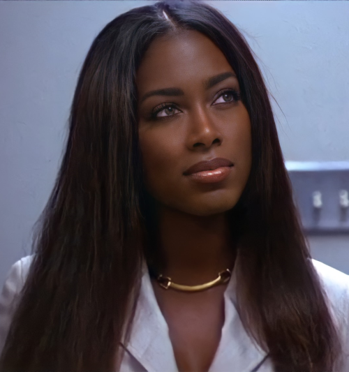  Kenya Moore in “Trois” (2000). 