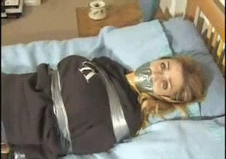 idietotapeyouup: gaggedfts:  Love how her head shakes and the tape gag moves subtly