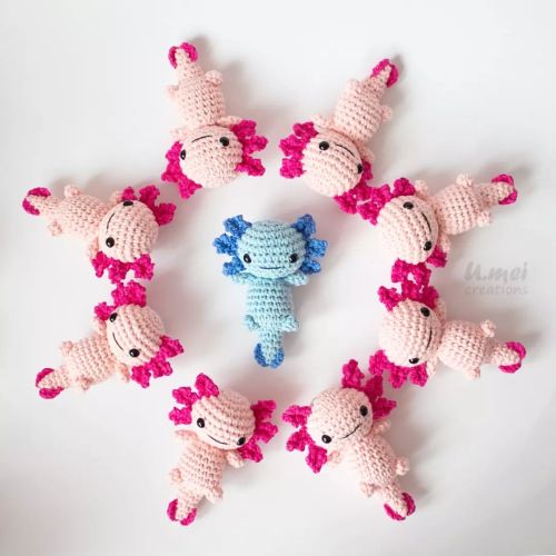 So many axolotls!  What colour should I make next?  Pink axolotl is available in my Etsy shop! [Link