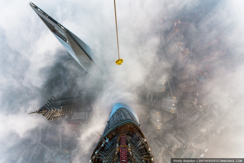 fergyness:  cjwho:  Rooftoppers Secretly Climb 650-Meter-High Crane in Shanghai by Vitaly Raskalov and Vadim Makhorov | via Russian photographers and adrenaline junkies Vitaly Raskalov and Vadim Makhorov, who are no strangers to traveling to the world’s