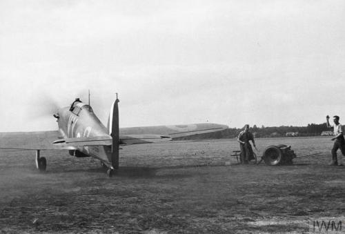 A Hawker Hurricane Mk. I, flown by the CO of No. 83 Squadron,Squadron Leader Peter Townsend, taxiing