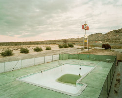 archatlas:  No Lifeguard on Duty   No Lifeguard on Duty by J Bennett Fitts is a selection of images from a series on abandoned motel pools across the United States.   