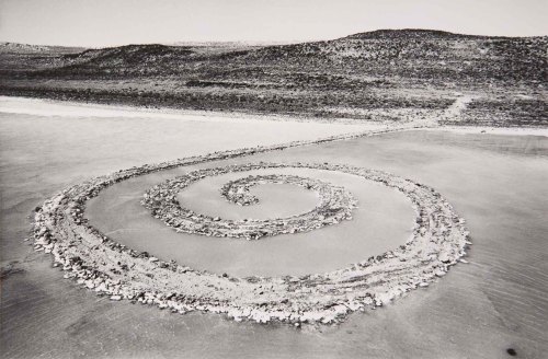nobrashfestivity:Robert Smithson, Spiral Jetty, 1970, Rozel Point, Great Salt Lake, Utah, black basalt rock, salt crystals, earth, and water, 1,500 ft. long and approximately 15 ft. wide. © Holt/Smithson Foundation and Dia Art Foundation, licensed by