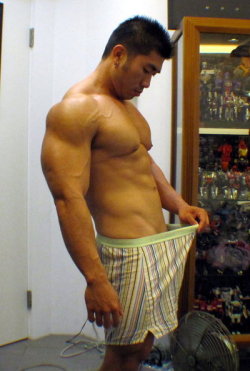 asianmalemuscle:  sungodsing:  Muscle hunk looking at his bird  Enjoy thousands of images in the archive: http://asianmalemuscle.tumblr.com/archive 