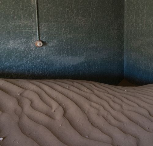 cjwho:  Pictures from a Ghost Town “The Sands of Time” by Romain Veillon | via It would seem that Romain Veillon has a thing for deserted places. The French photographer’s website is filled with stunning shots of desolate buildings and his eye captures