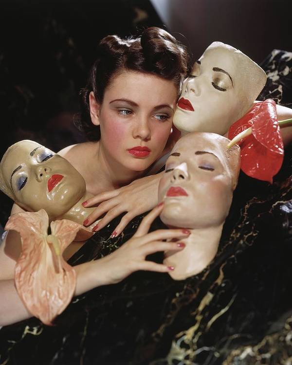 Gene Tierney with masks. Vogue, June 1st, 1940, photo by Horst P. Horst.