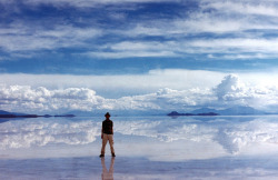 fruitelf:  hopeydopey526:  gpwhs:  Jesus Christ, this is a real place. The world’s biggest salt flat -the ground turns into a giant mirror when it rains. This might even be better than the Aurora Borealis. I’ve never seen space like that, let alone