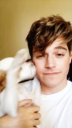 boycalled-froy:  dunno who’s more adorable, the puppy or the hooman @froymusic