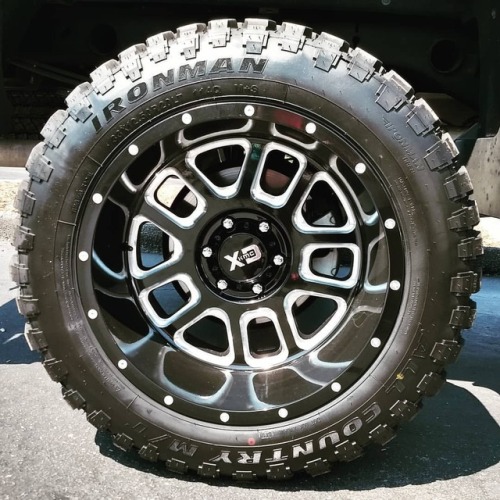 GMC Sierra wearing Ironman All Country M/T tires on KMC XD828 Gloss Black Milled #kmcwheels #gmc #ir