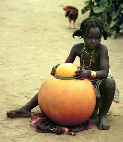bhavatarini:  afrikanattire:  Fulani Boy, Plateau State, Nigeria by gdstone on Flickr.  This boy is too pretty. Gotta invest in some copper bracelets..    Gorgeous