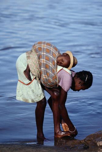   Madagascar: Portraits of Malagasy women of different ethnicities.  Names unknown. Photos by: Frans Lanting  