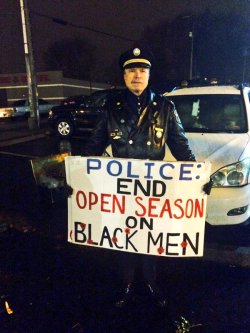 ghettablasta:  Two photos 1.Former Philadelphia Police Captain Ray Lewis Is standing with Protesters in #Ferguson against police brutality  2.Here’s a picture of Lewis being arrested.    