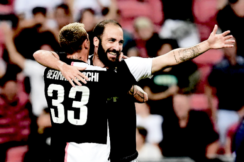  Gonzalo Higuain celebrates with Federico Bernardeschi after scoring during the International Champi