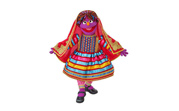 Sesame Street introduces first Afghan Muppet, Zari“Zari is a 6-year-old girl who’s “curious and eager” and whose name means “shimmering.” ”