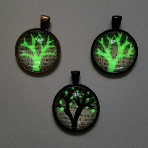 katarinanavane:Hand drawn/painted glow in the dark pendants. These photos are cropped but otherwise 